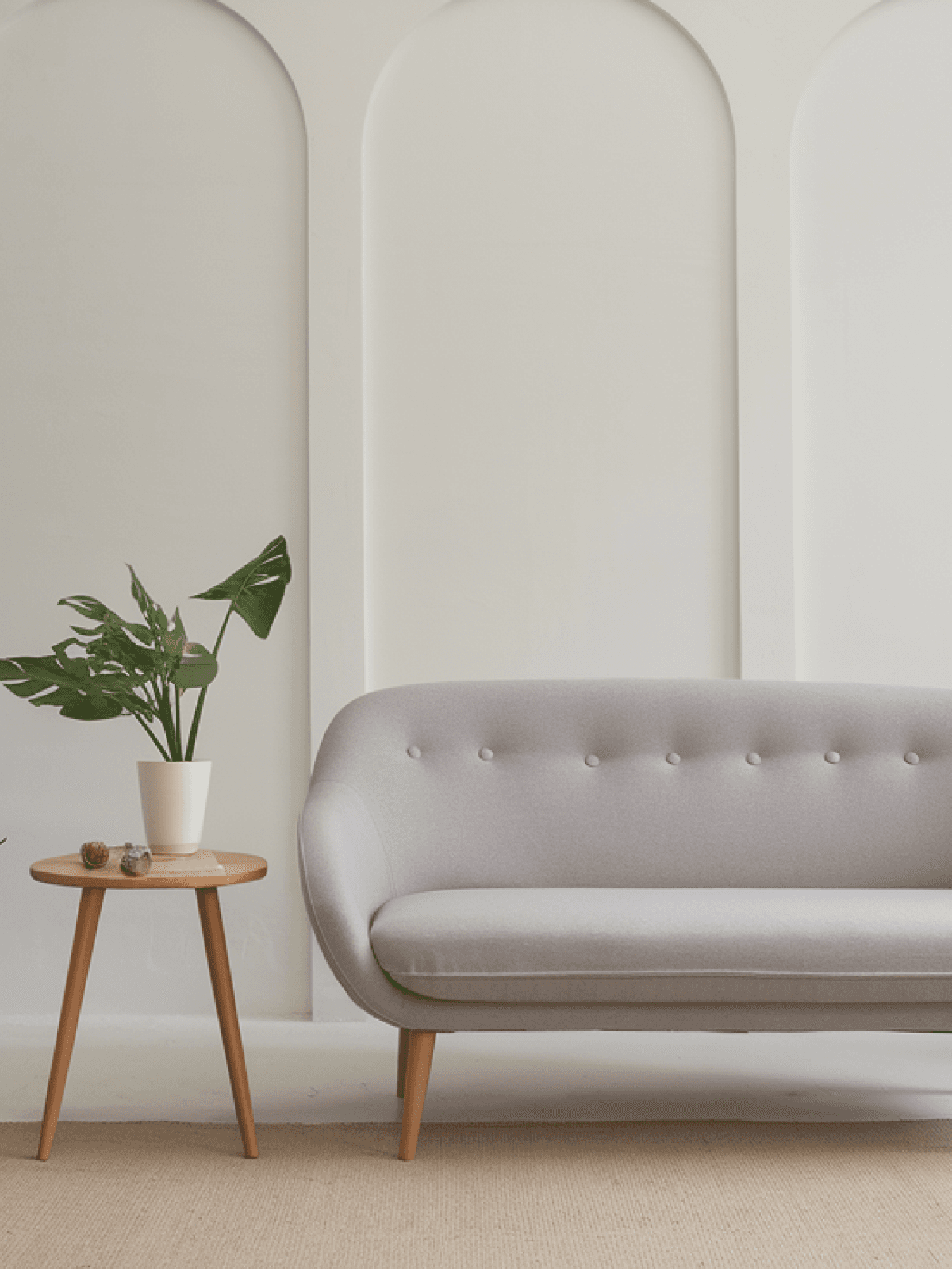 Gray one-seater sofa and wooden coffee table